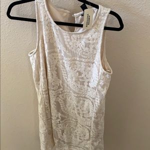 cream dress with beautiful detail